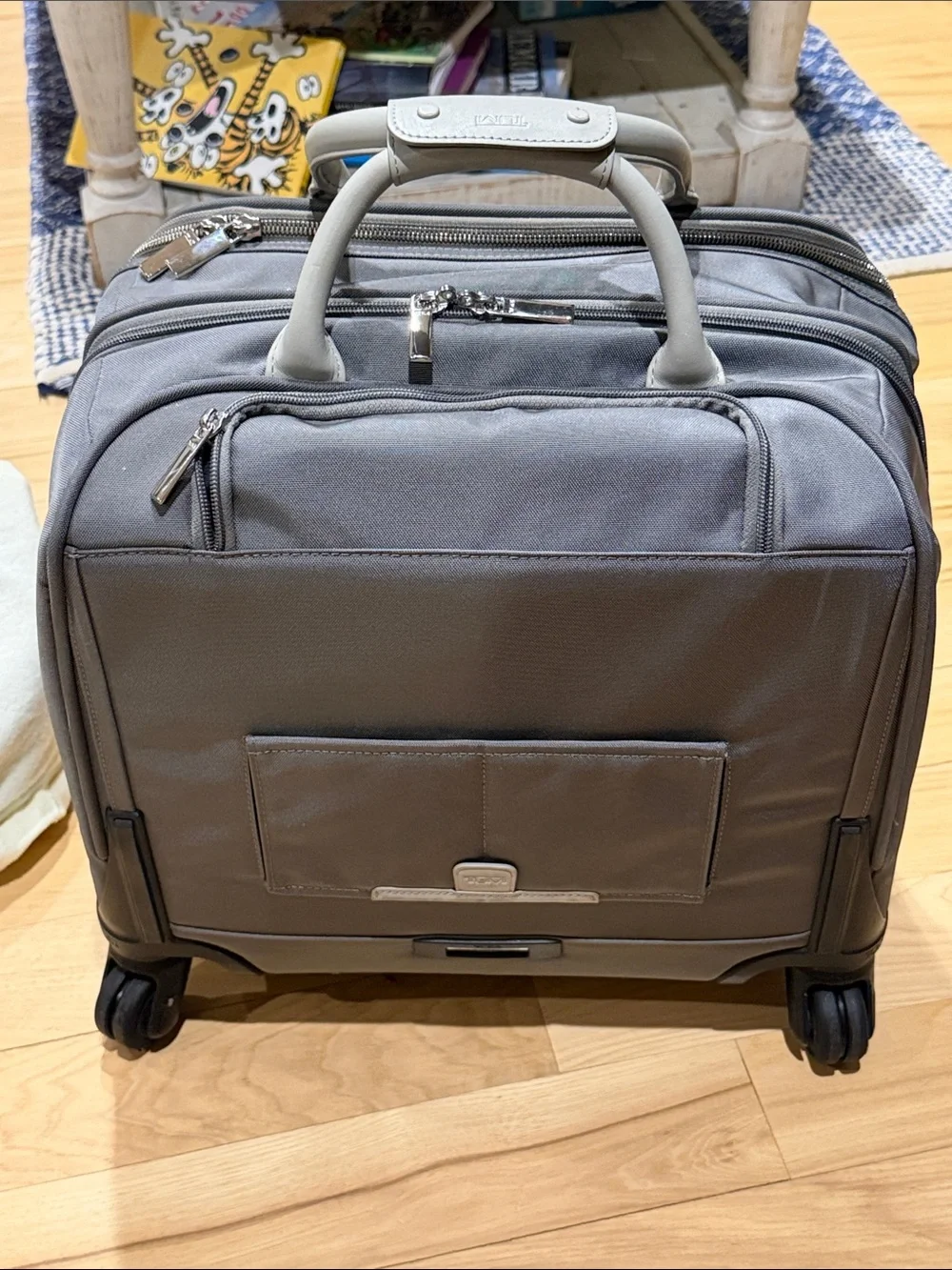 Tumi Navy and Light Gray Travel Carry On Roller Bag - Sleek Front Pouch